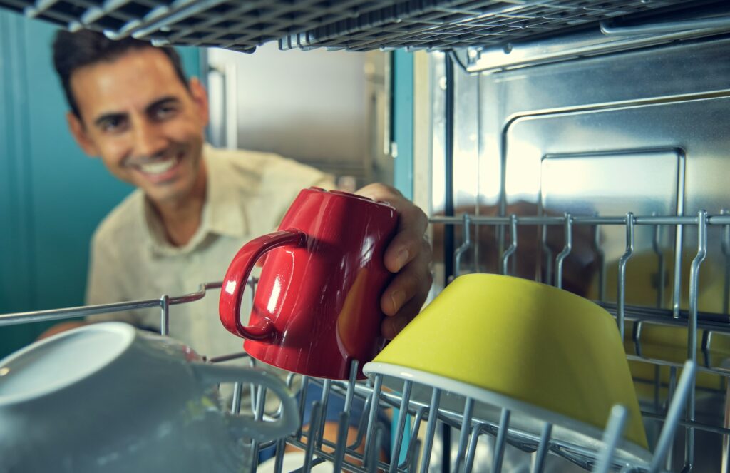 Taking cup out of the dishwasher